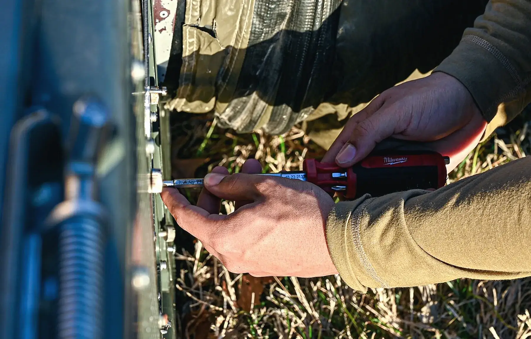 HVAC technician servicing climate-control equipment