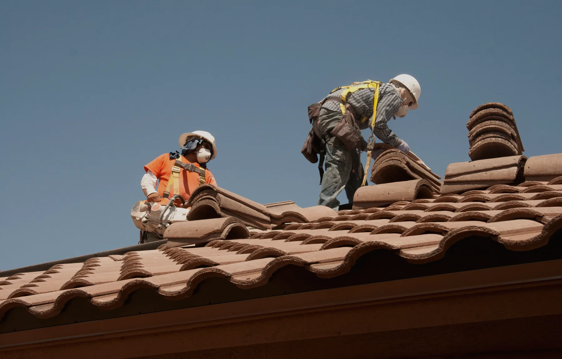 Roofing team working on a residential roof